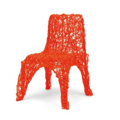 Extruded chair by Tom Dixon
